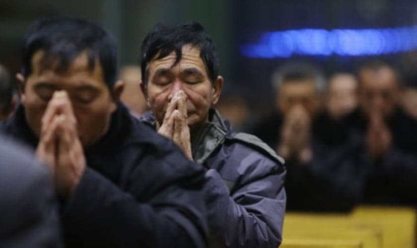 Cristão chinês em momento de oração em Xiliulin, na China. (Photo: CNS)