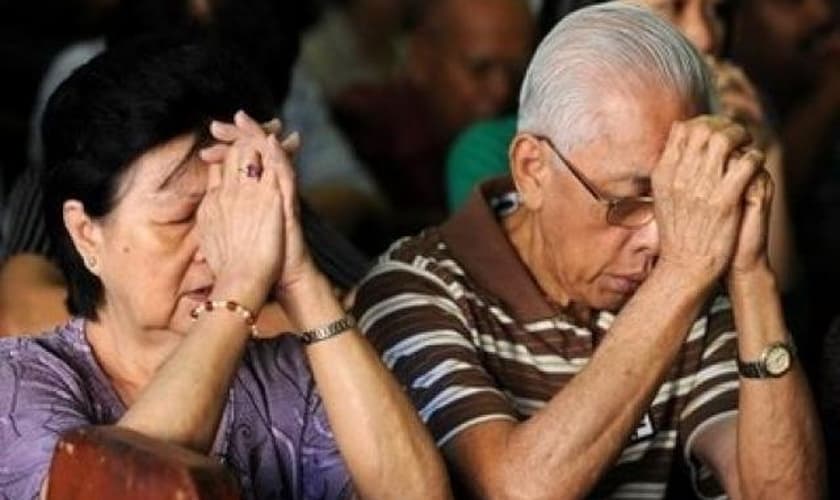 Spring e seus 9 irmãos foram proibidos de ir à igreja, mas não desistiram de ganhar os pais para Jesus. (Foto: Herald Malaysia).