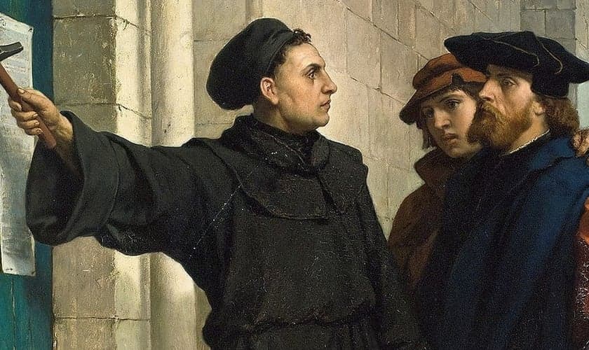 Lutero e a pregação das 95 teses na porta da capela de Wittemberg. (Imagem: Ferdinand Pauwels / domínio público)